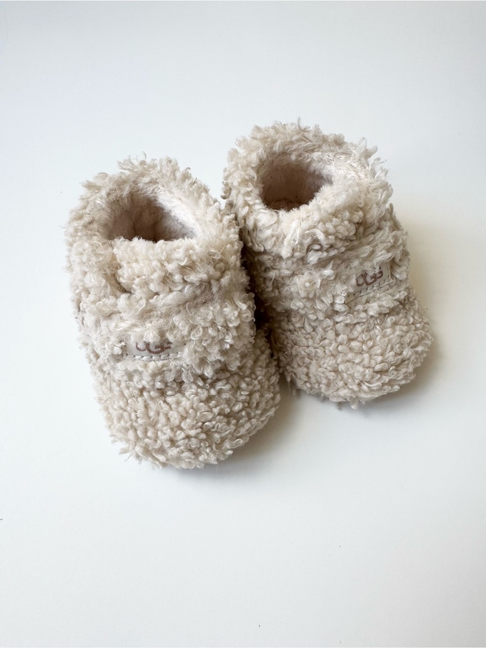 UGG Baby Bixbee Faux Fur Booties in Beige